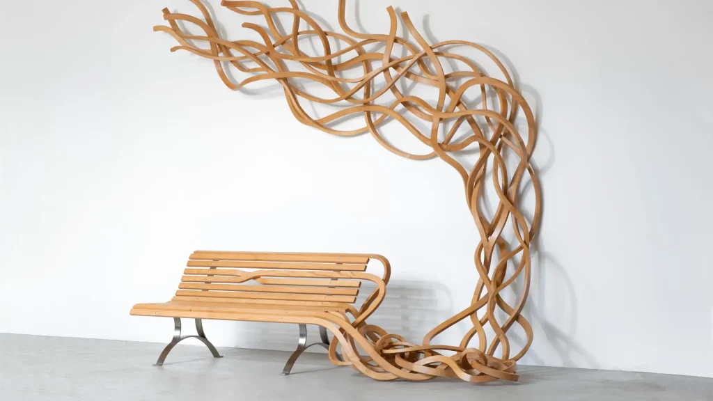 Curly Bench, madera esculpida y acero inoxidable, 20019 © Rodrigo Reinoso