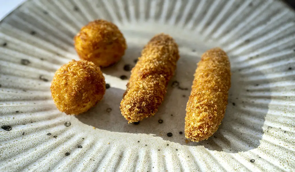 mejores croquetas Madrid 2026 Taberna de Elia